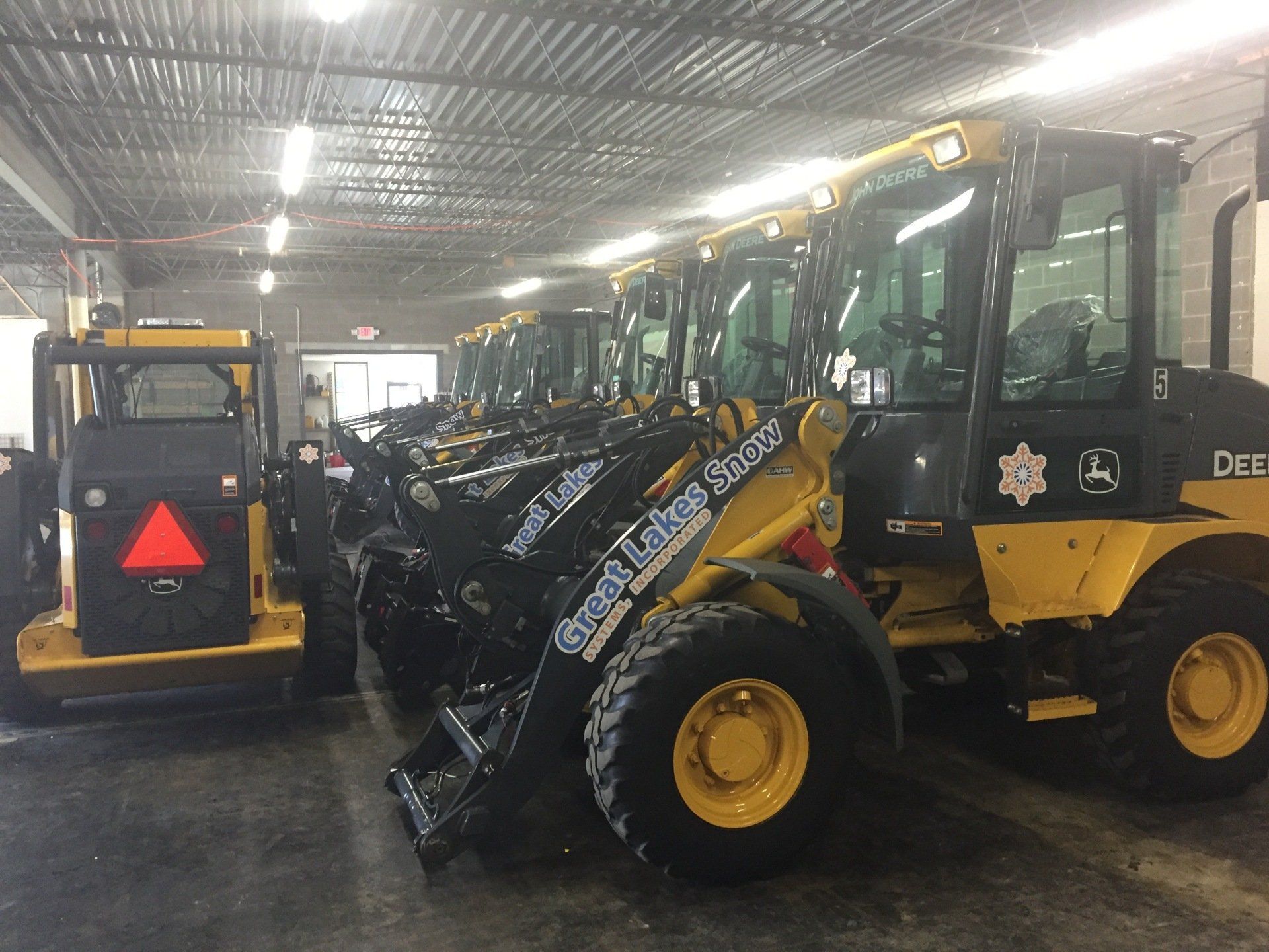 Great Lakes Snow commercial snow removal equipment fleet stored and ready for winter service.