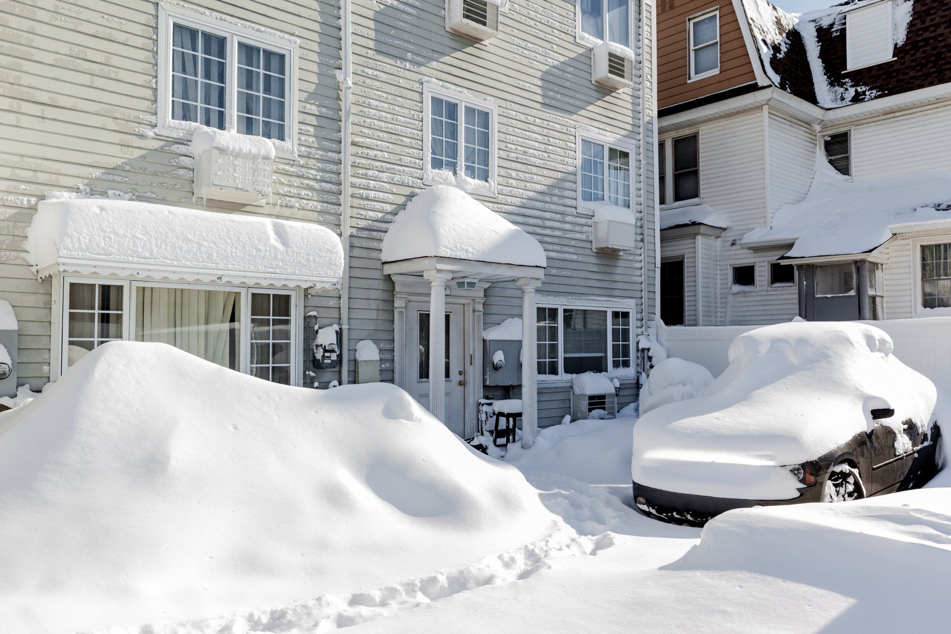 Snow mound near a commercial building in the Chicagoland area.