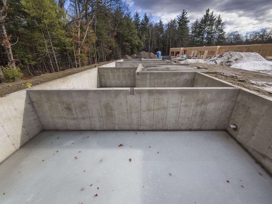 The picture shows, concrete foundation of a new construction before the building is built