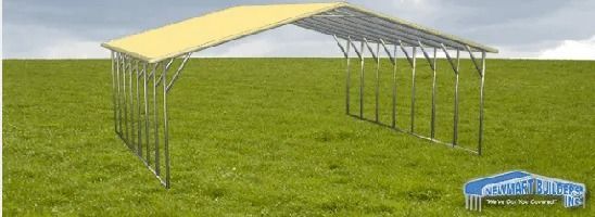 Open-sided metal-roof shelter structure on grass, with yellow and gray panels.