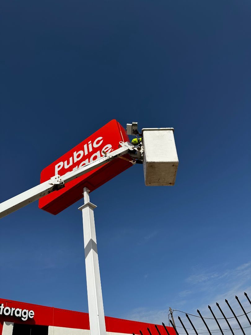 A large red sign that says public storage on it