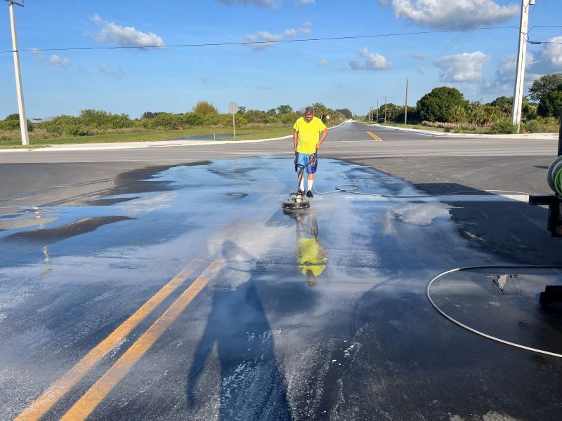 Image showing RNR pressure Cleaning Power Washing A Commercial Spill.