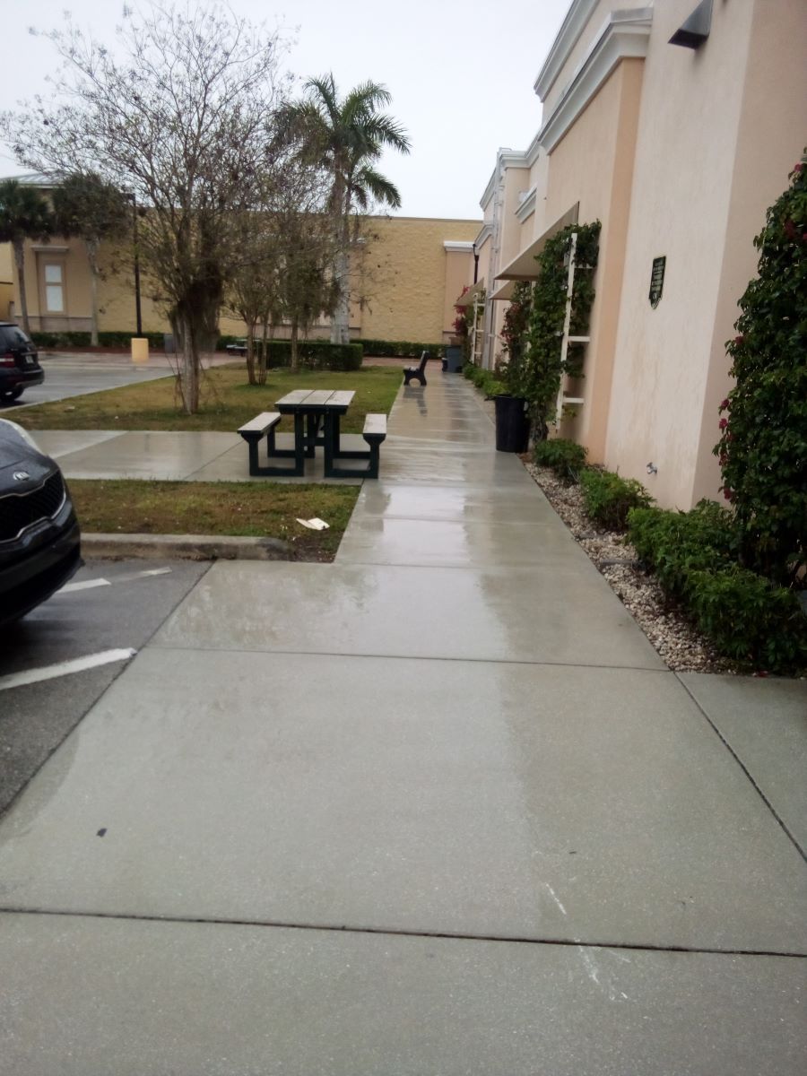 Image of a sidewalk cleaning job in Port St. lucie fl.