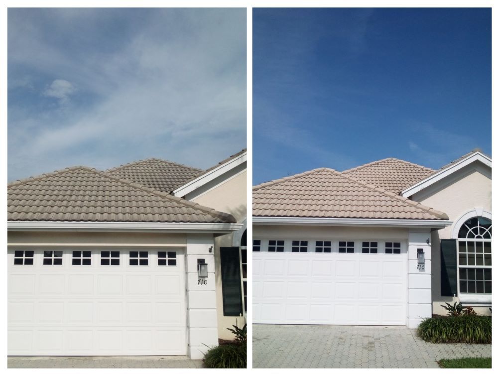 Image Of RNR Pressure Cleaning on a tile roof providing roof soft washing services. 