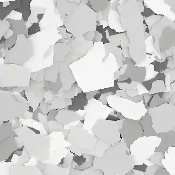 Pile of white and gray paper scraps scattered in a close-up view