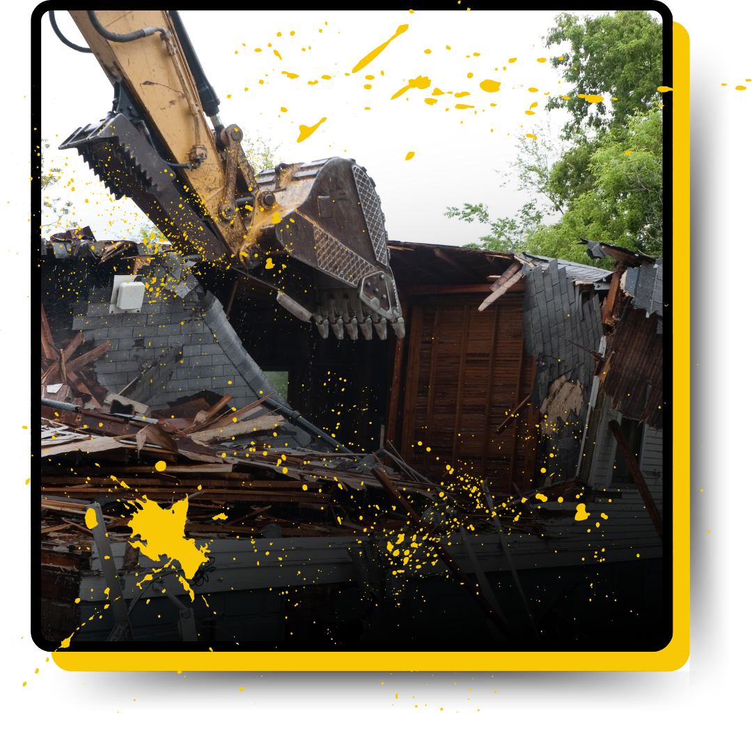 A house being demolished of an excavator