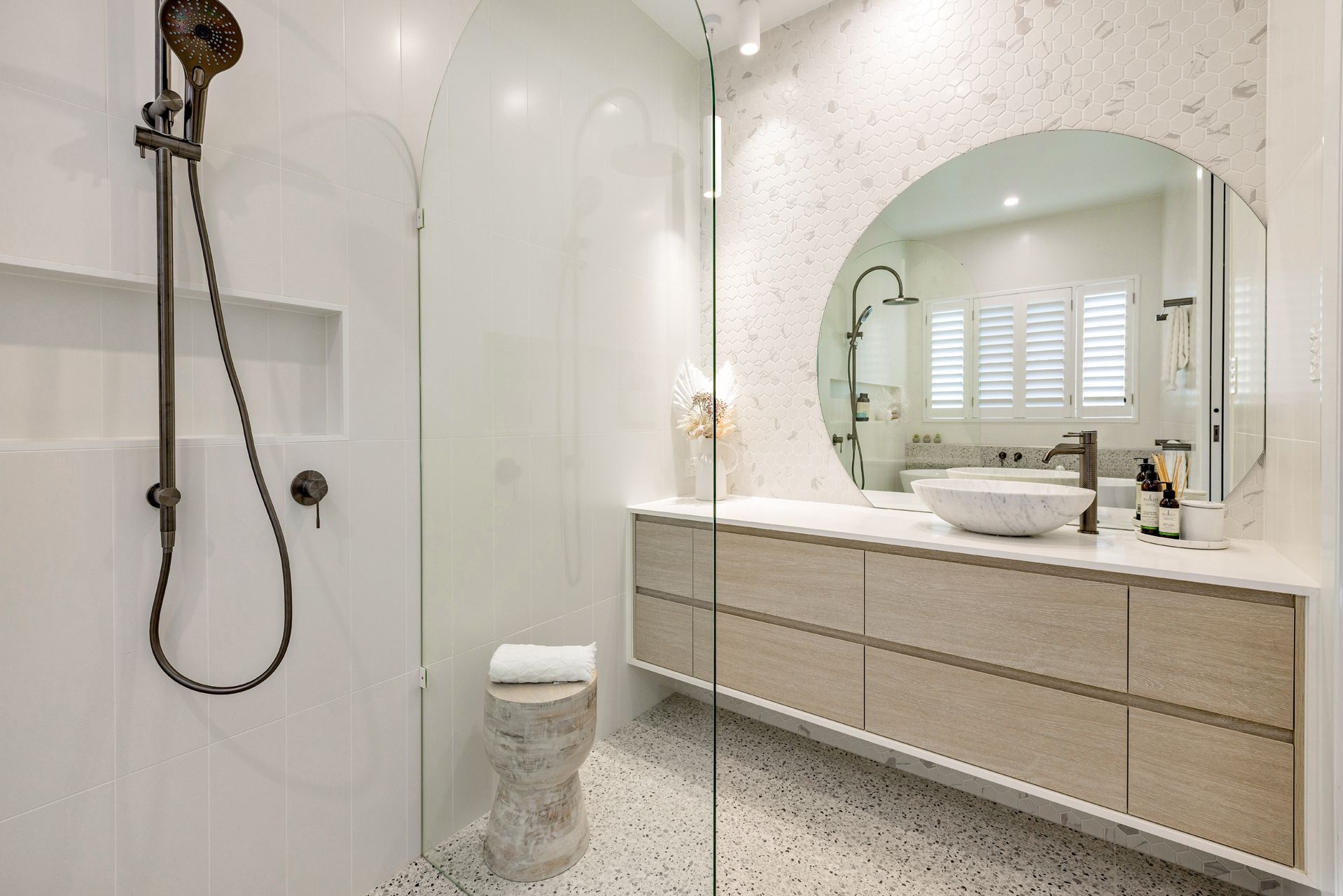 A Modern Bathroom With a Glass-enclosed Shower — Ashlee Jones Homes in Gordonvale, QLD