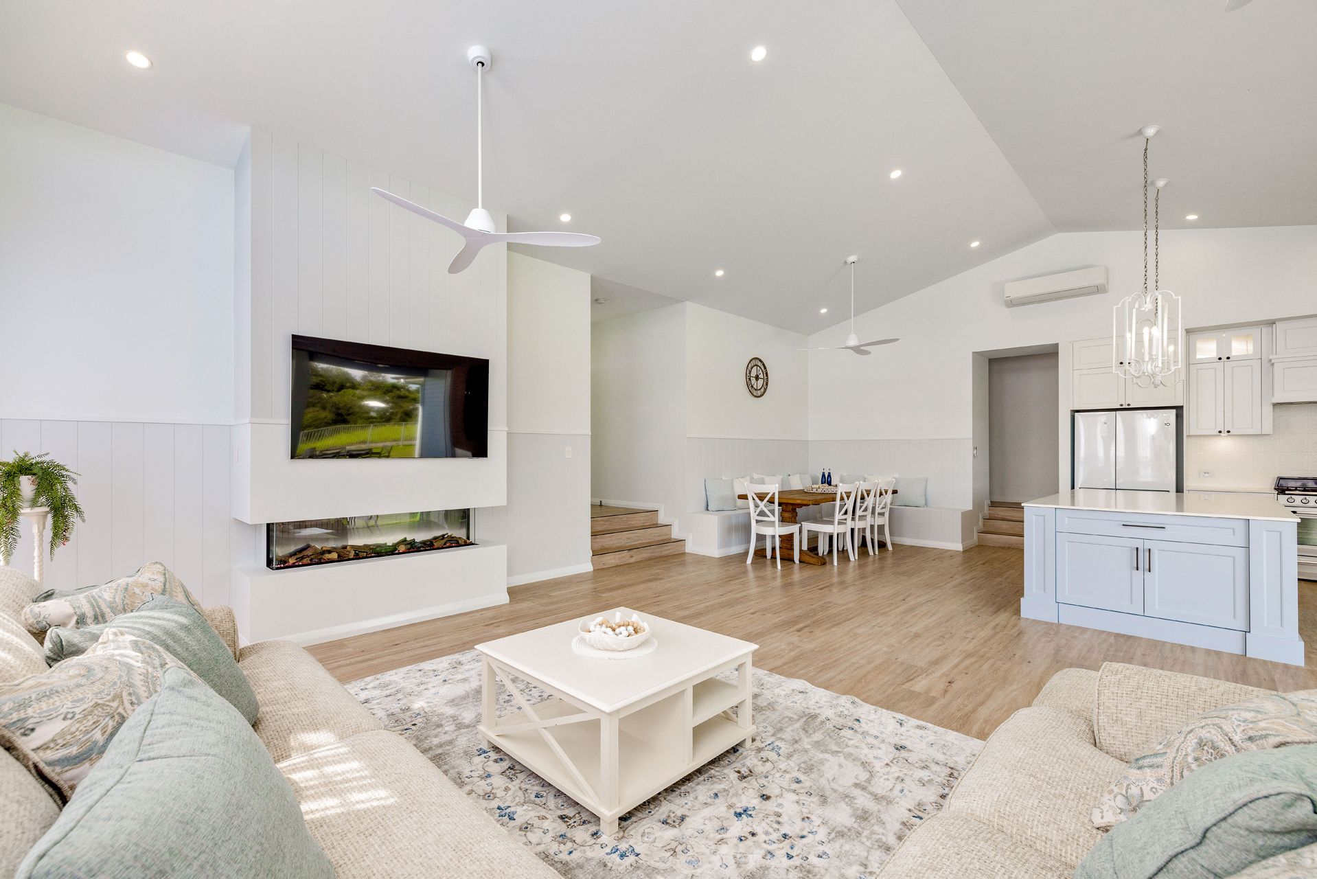 Bright, Open-concept Living Area With White Wall — Ashlee Jones Homes in Gordonvale, QLD