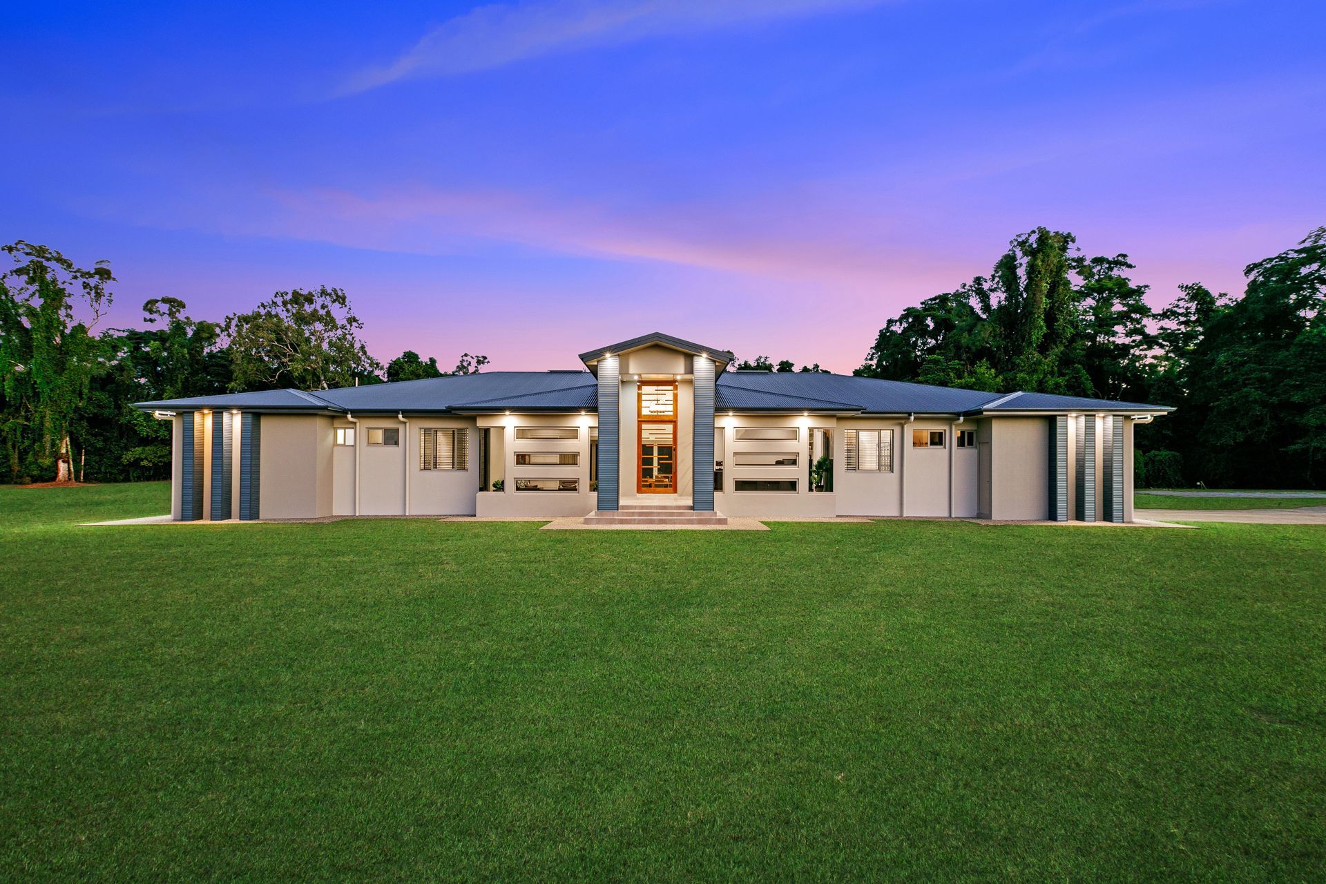 A Modern, Single-story Light-colored House — Ashlee Jones Homes in Gordonvale, QLD
