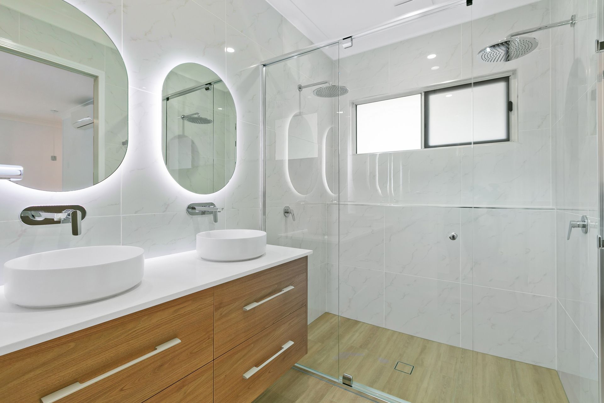 Modern Bathroom With White Tiled Walls, Double Vanity — Ashlee Jones Homes in Gordonvale, QLD