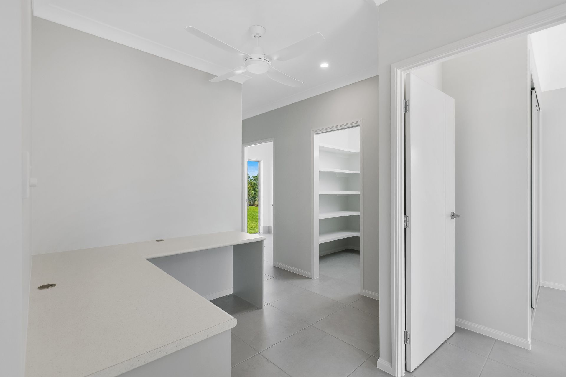 An Interior View of a Room With a Corner Desk — Ashlee Jones Homes in Gordonvale, QLD