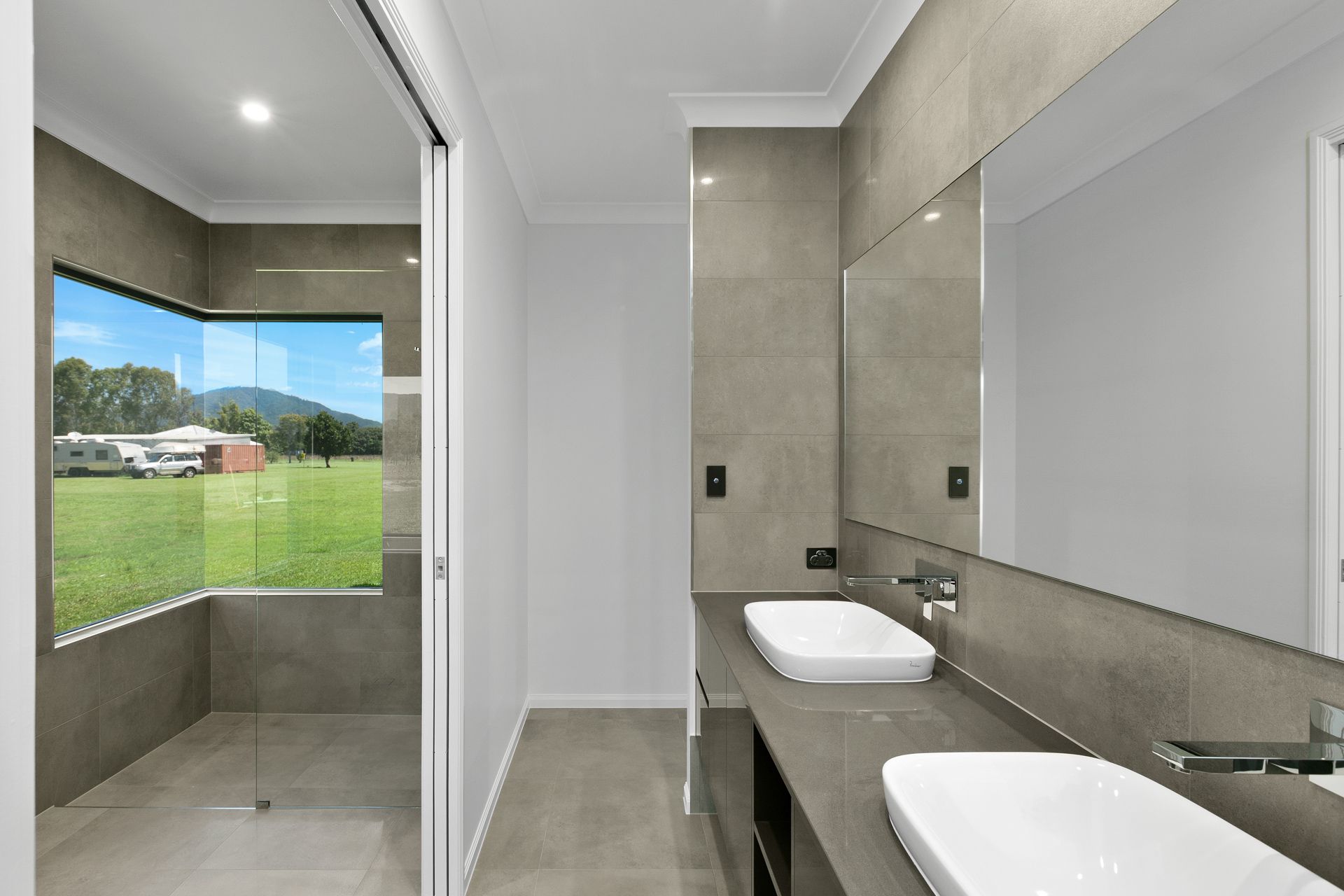 Modern Bathroom Featuring a Double Vanity — Ashlee Jones Homes in Gordonvale, QLD
