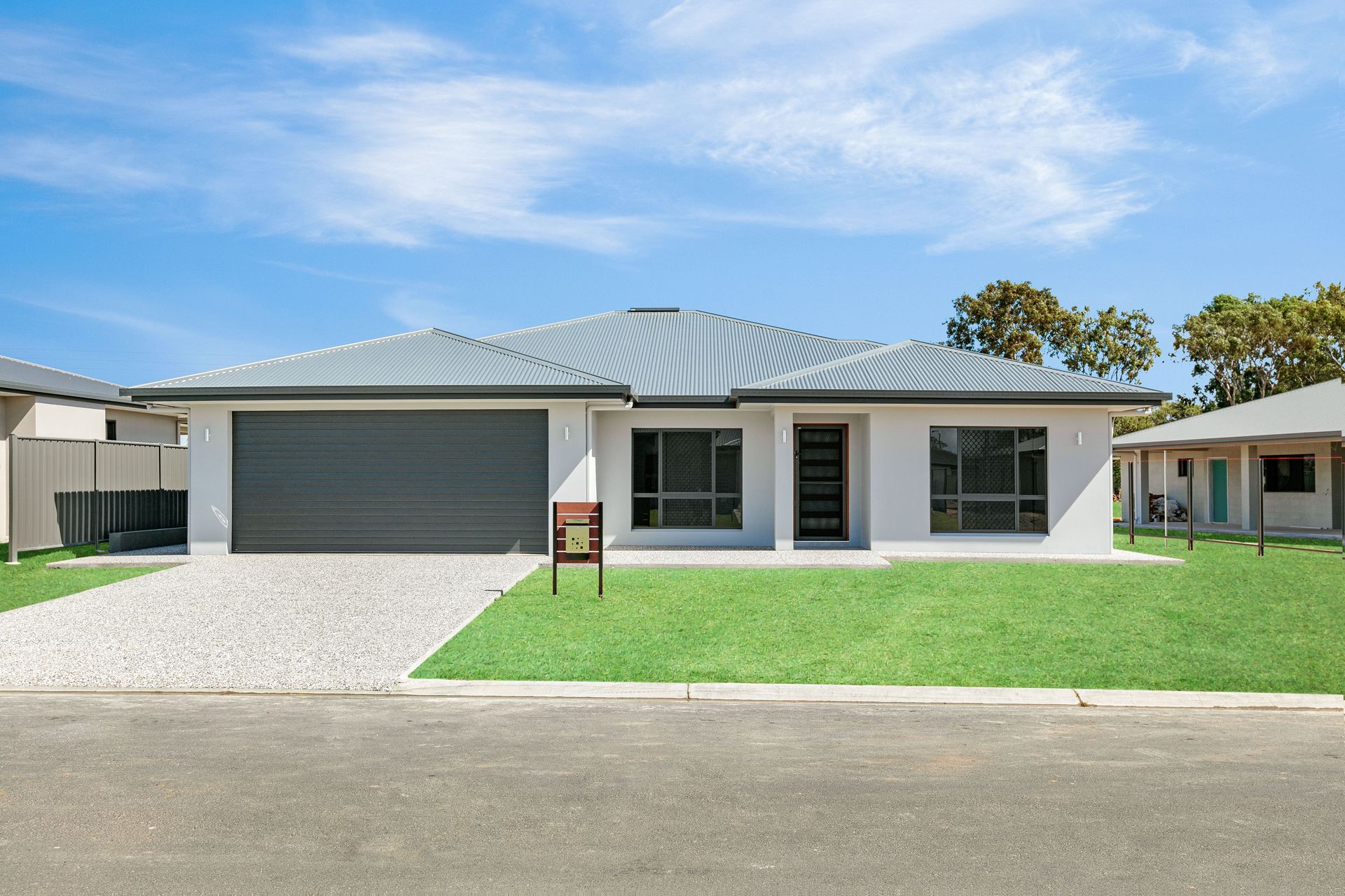 A Modern Single-story Suburban House With a Gray Roof — Ashlee Jones Homes in Gordonvale, QLD