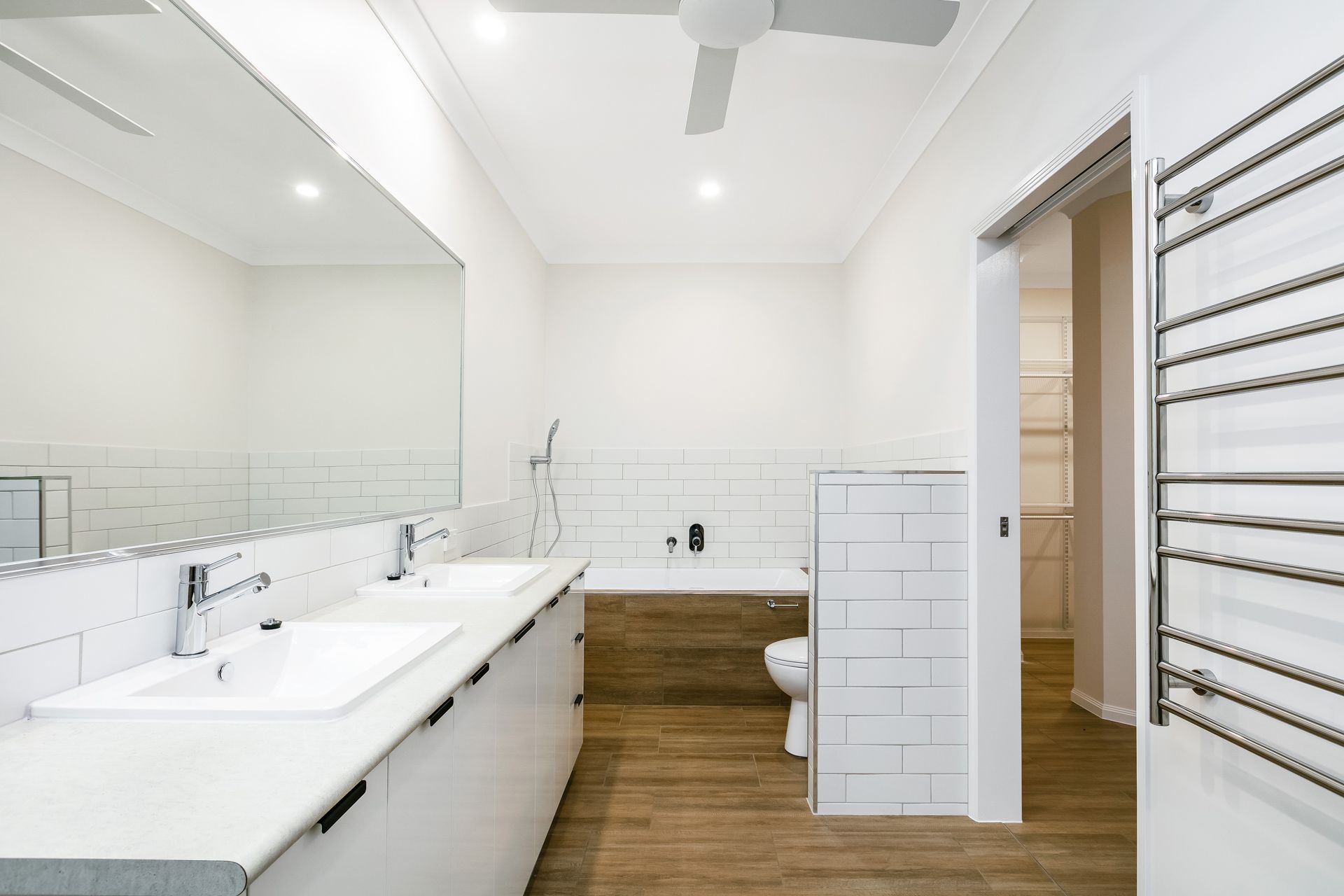 A Modern Bathroom With a Double Vanity — Ashlee Jones Homes in Gordonvale, QLD