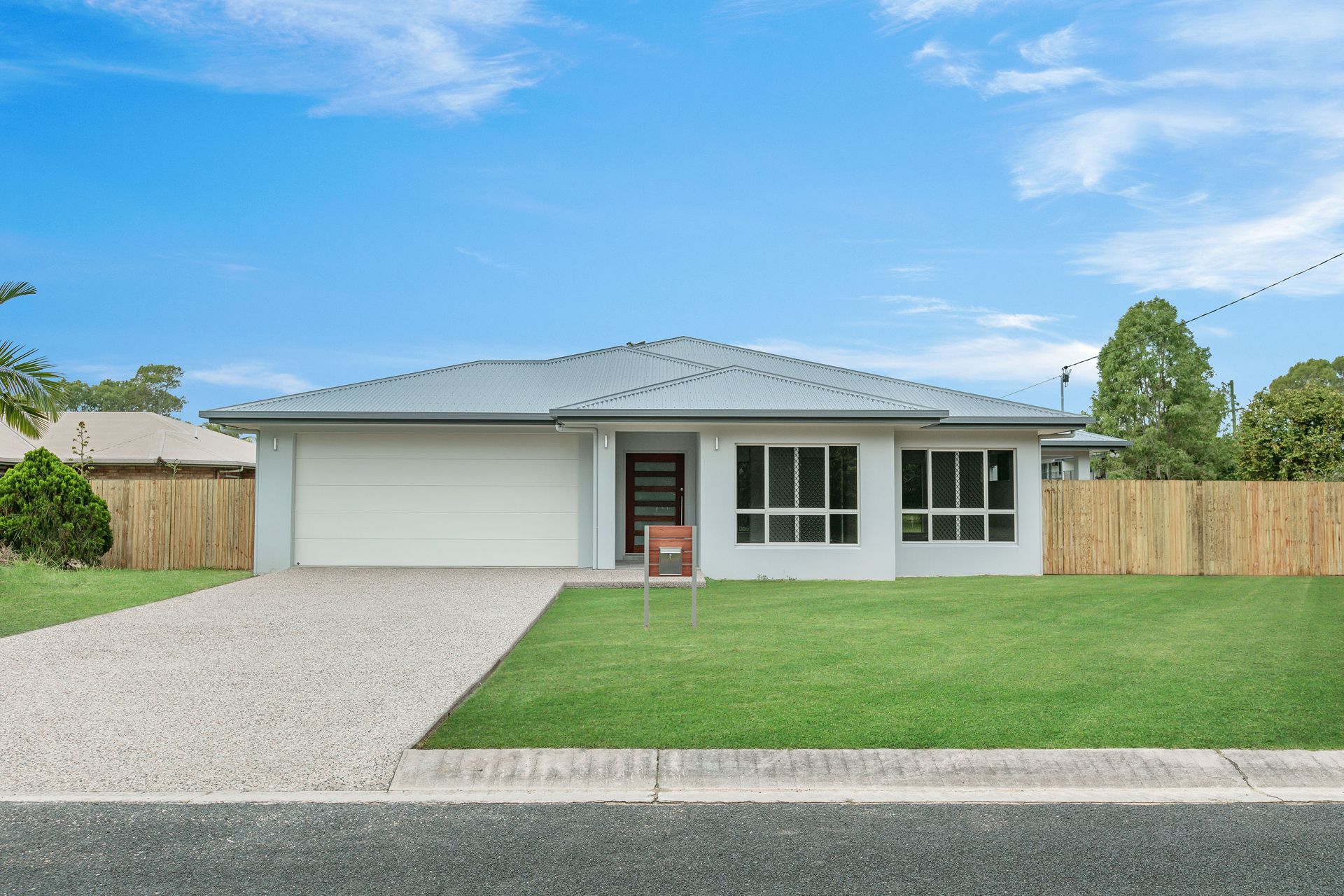 Single-story Suburban House With a Gray Roof — Ashlee Jones Homes in Gordonvale, QLD