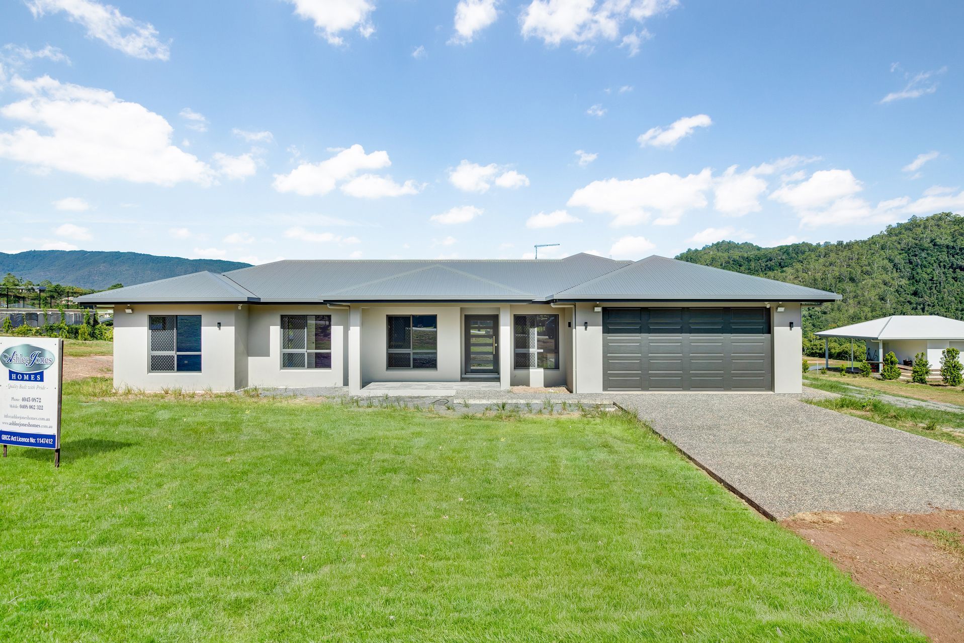 A Modern, Light-colored Single-story House — Ashlee Jones Homes in Gordonvale, QLD