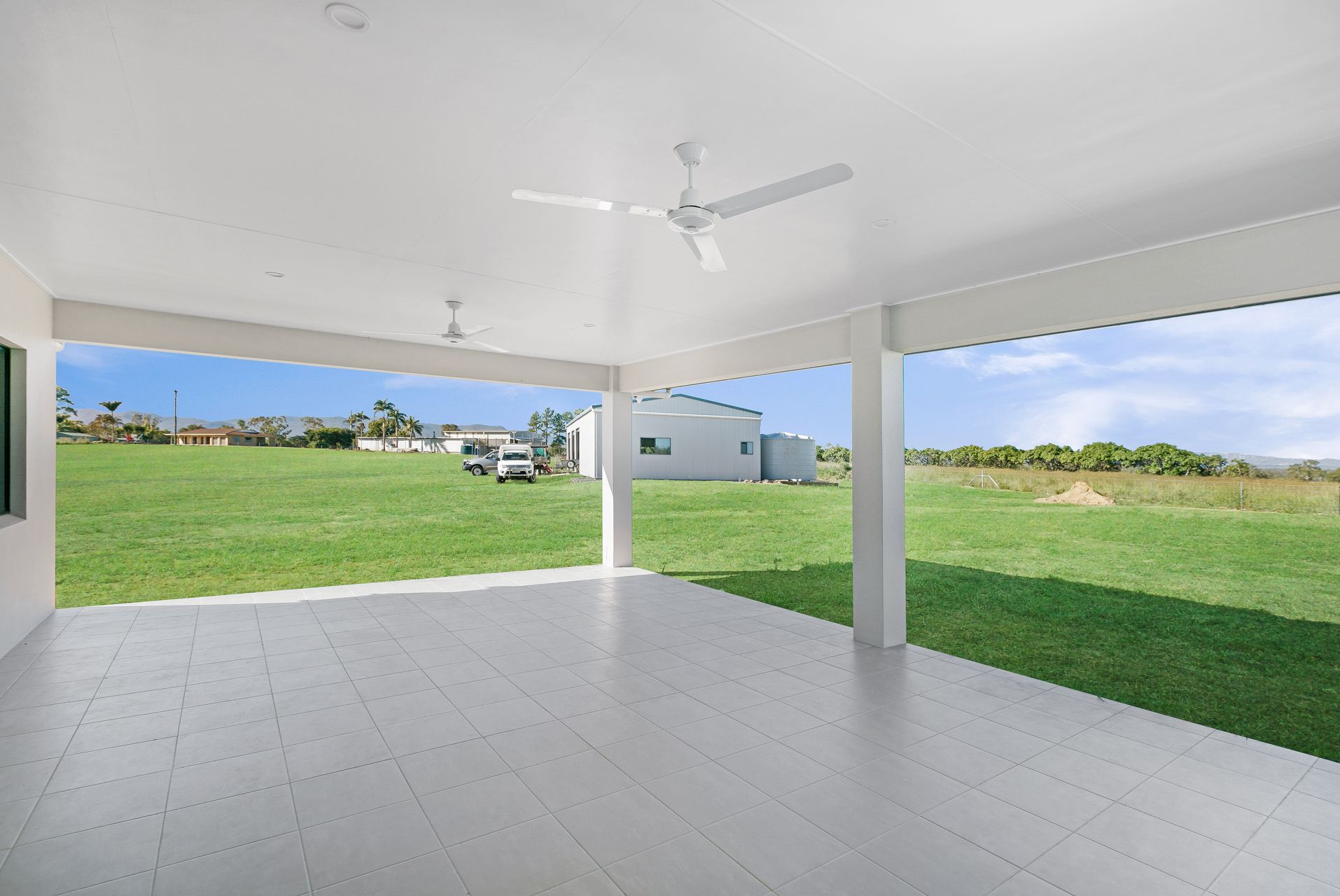 A Spacious, With Overlooking a Large, Grassy Field — Ashlee Jones Homes in Gordonvale, QLD