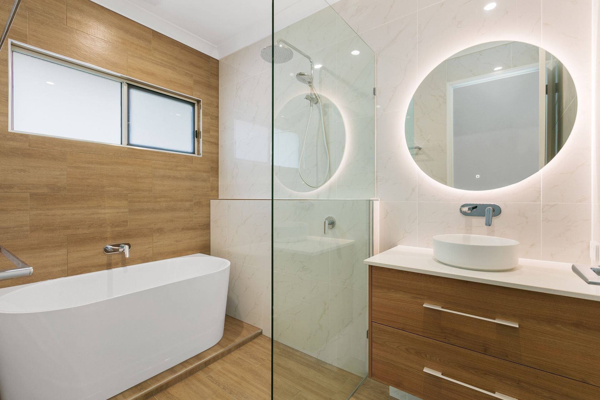 Modern Bathroom Featuring a Wood-panel Wall — Ashlee Jones Homes in Gordonvale, QLD