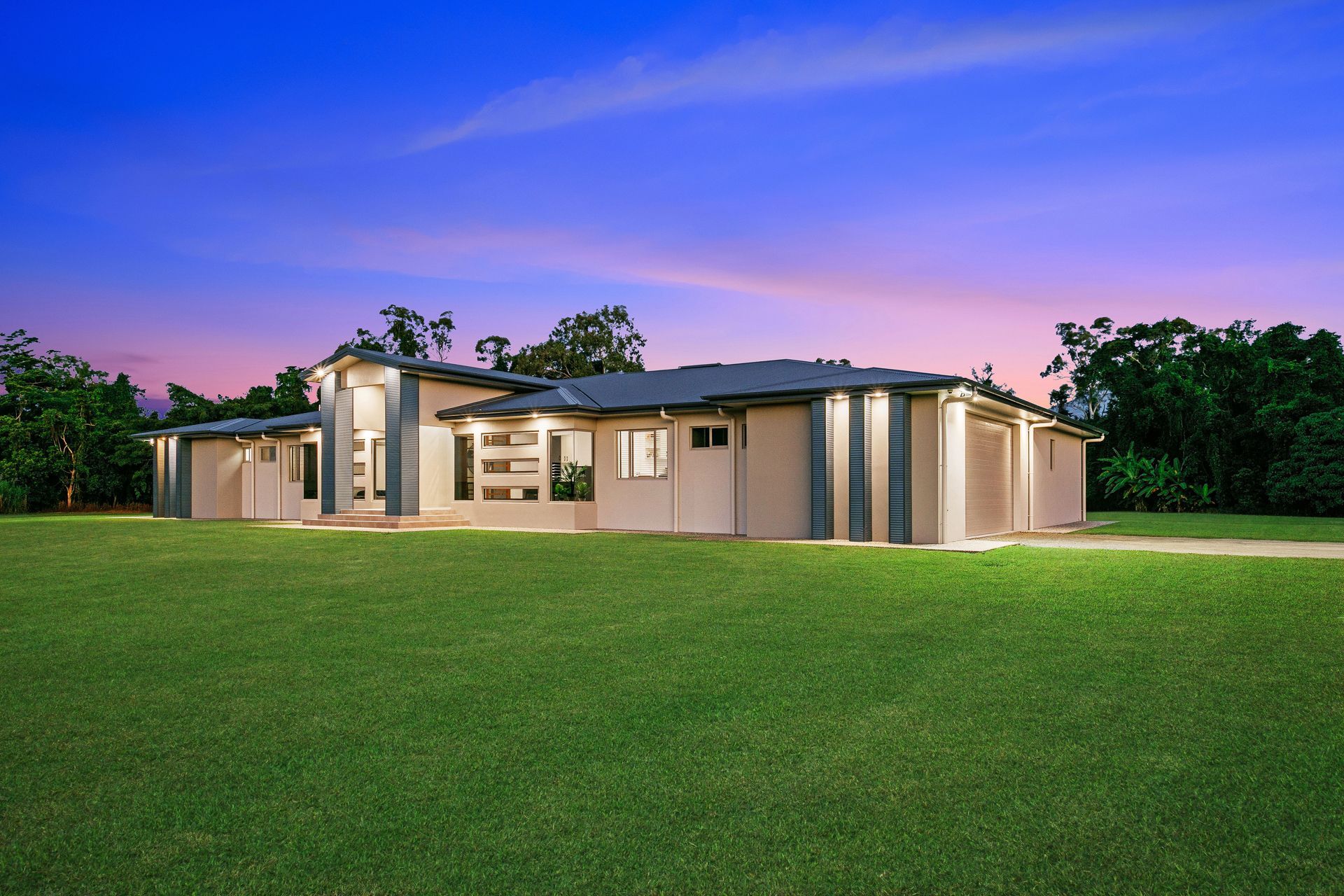 Single-story Suburban House With Beige Walls and a Gray Roof — Ashlee Jones Homes in Gordonvale, QLD