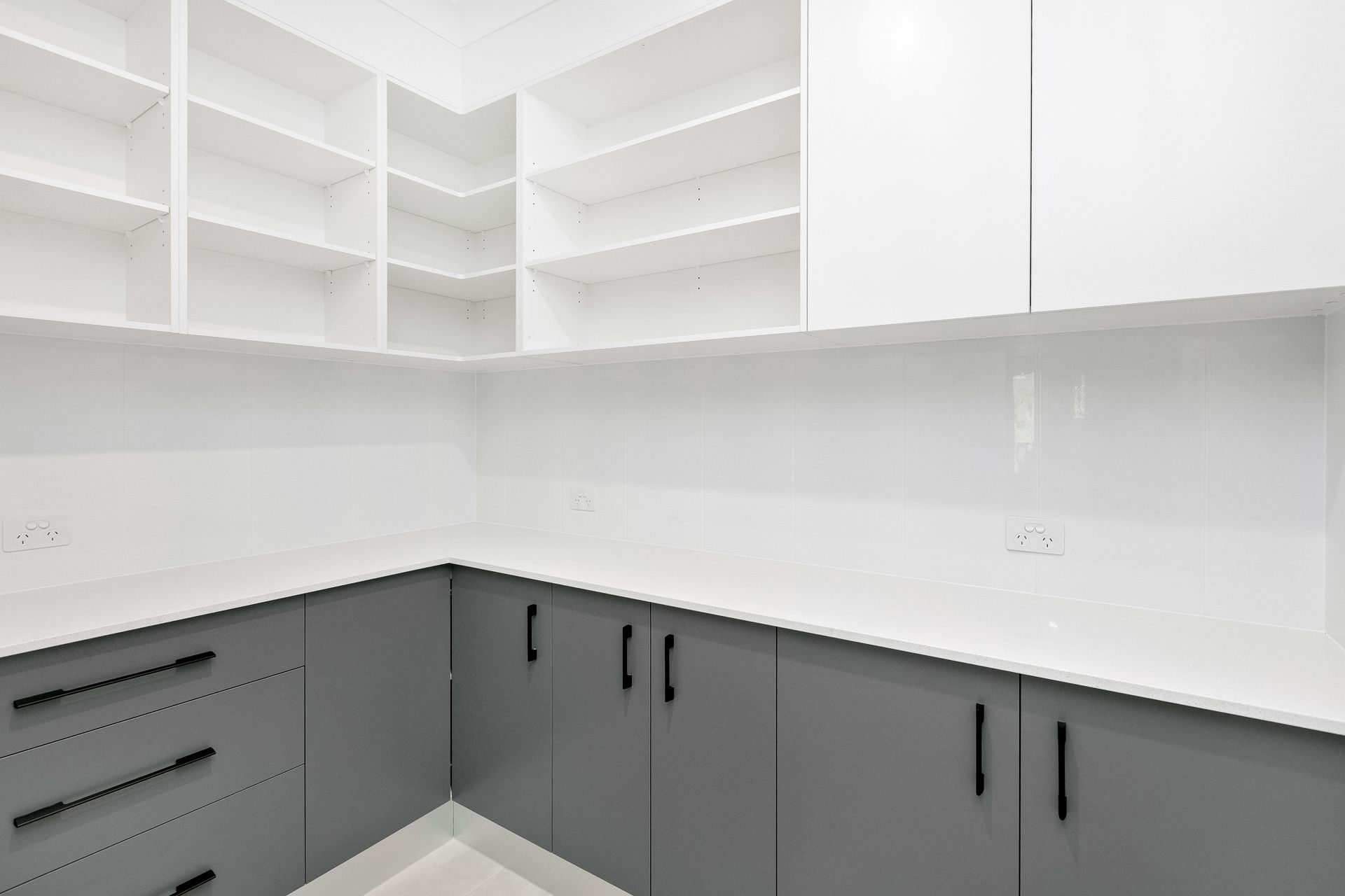 Modern Pantry With White Shelving, White Countertops — Ashlee Jones Homes in Gordonvale, QLD