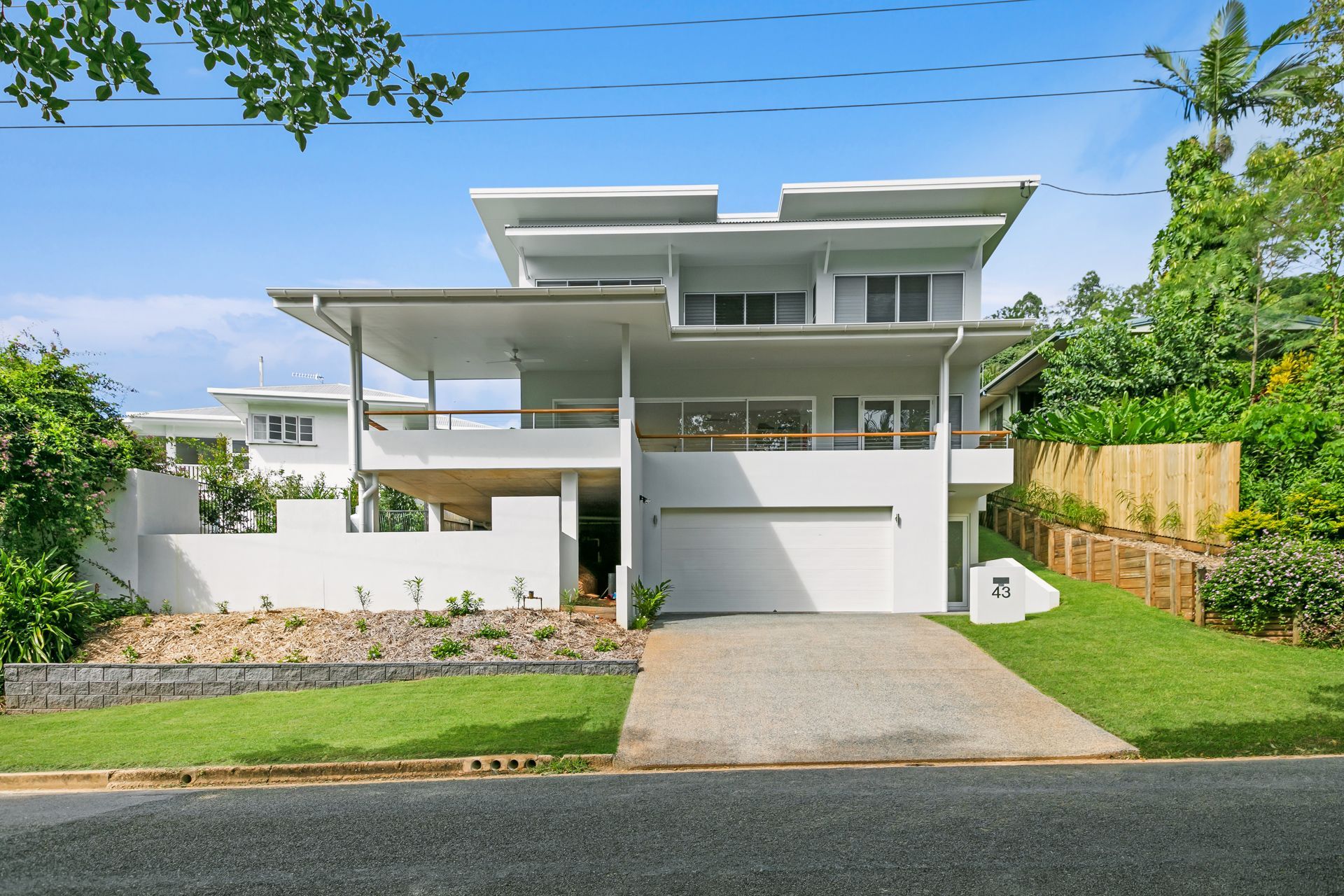 A Modern, Two-story White House With a Flat Roof — Ashlee Jones Homes in Gordonvale, QLD