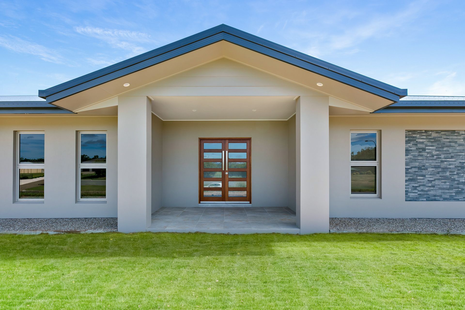 Modern, Single-story House With a Peaked Roof — Ashlee Jones Homes in Gordonvale, QLD