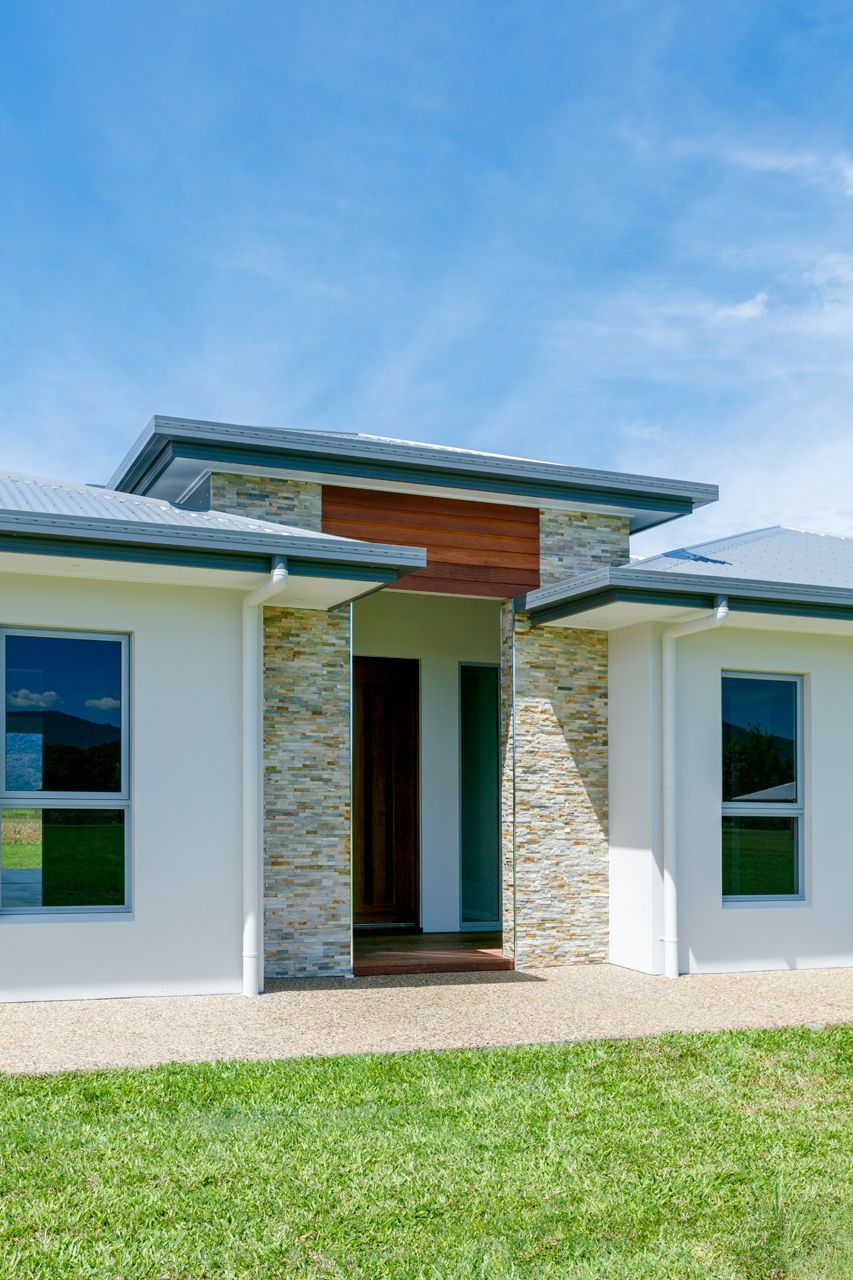 A Modern, Single-story House With White Walls — Ashlee Jones Homes in Gordonvale, QLD