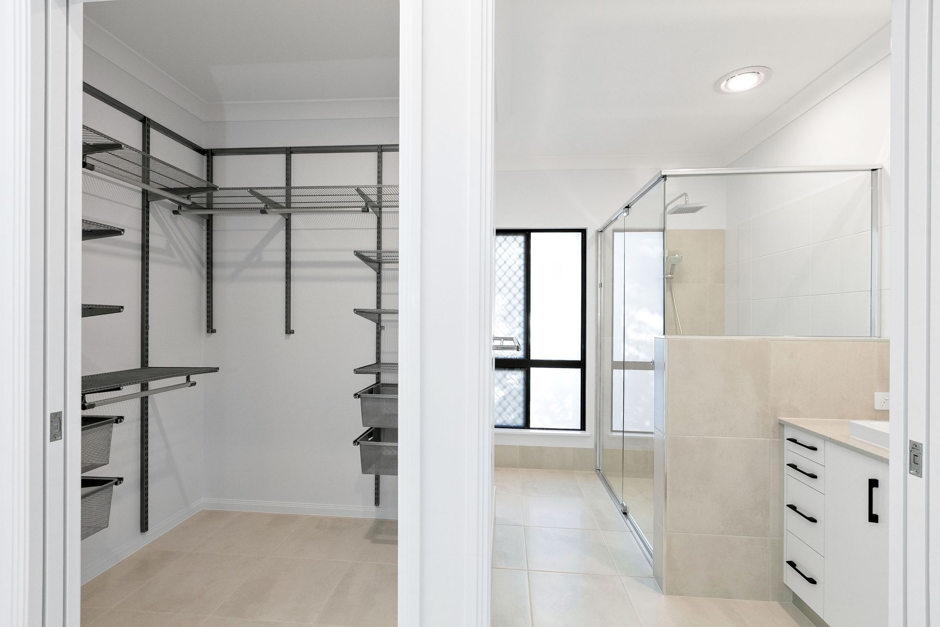 A View Through a Doorway Showing a Walk-in Closet — Ashlee Jones Homes in Gordonvale, QLD