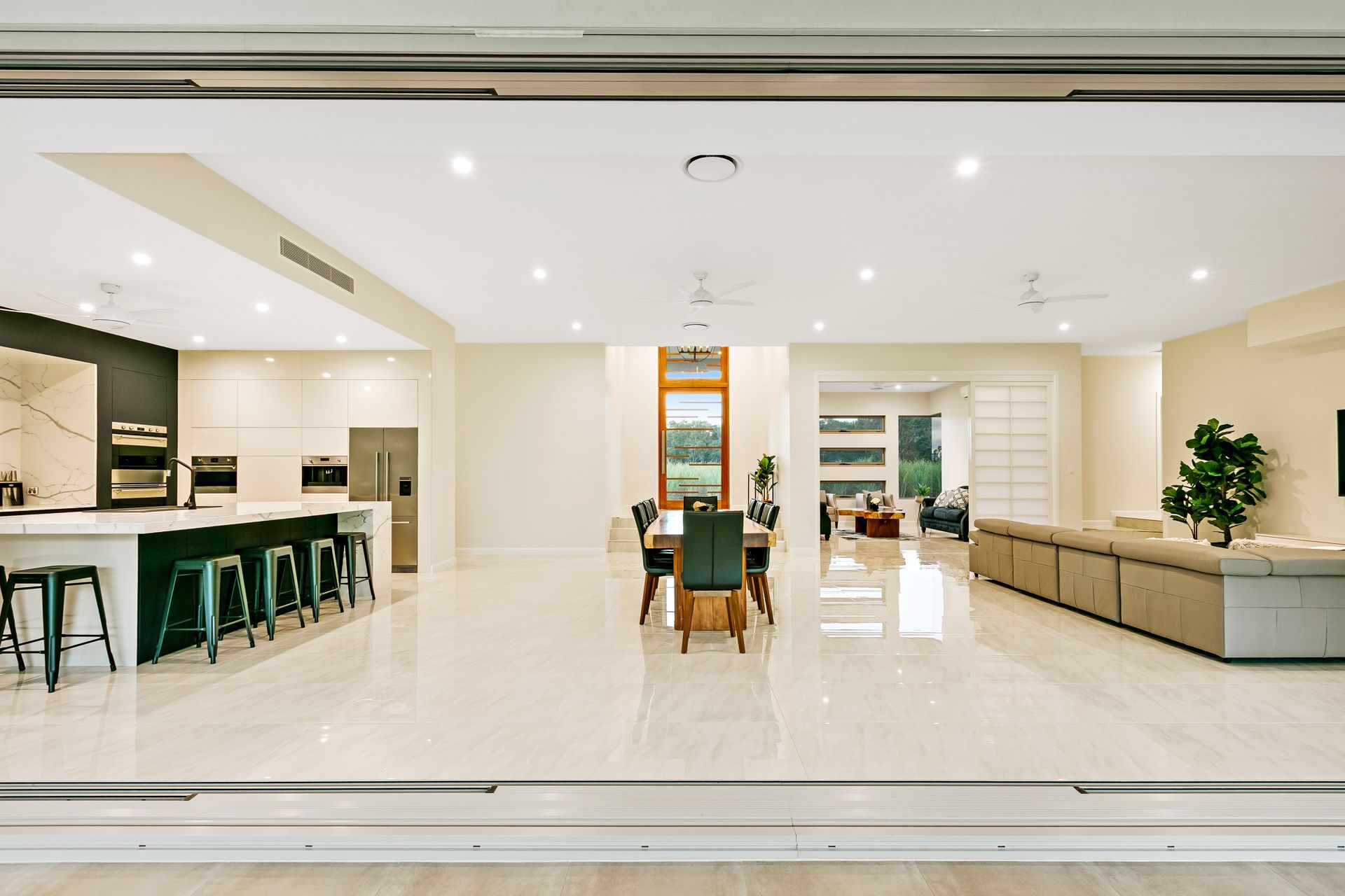 A Spacious, Modern Open-plan Home Featuring a Large Kitchen — Ashlee Jones Homes in Gordonvale, QLD
