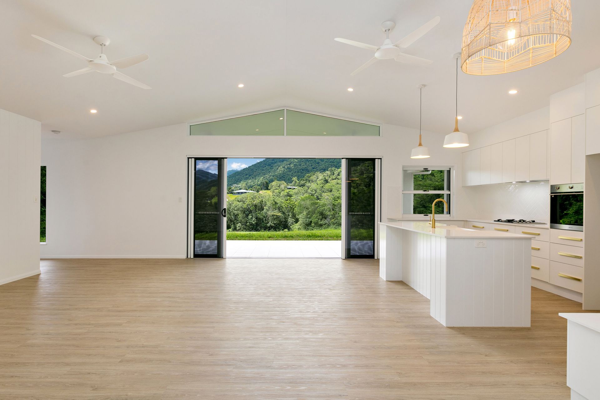 A Spacious, Minimalist Open-plan Kitchen — Ashlee Jones Homes in Gordonvale, QLD