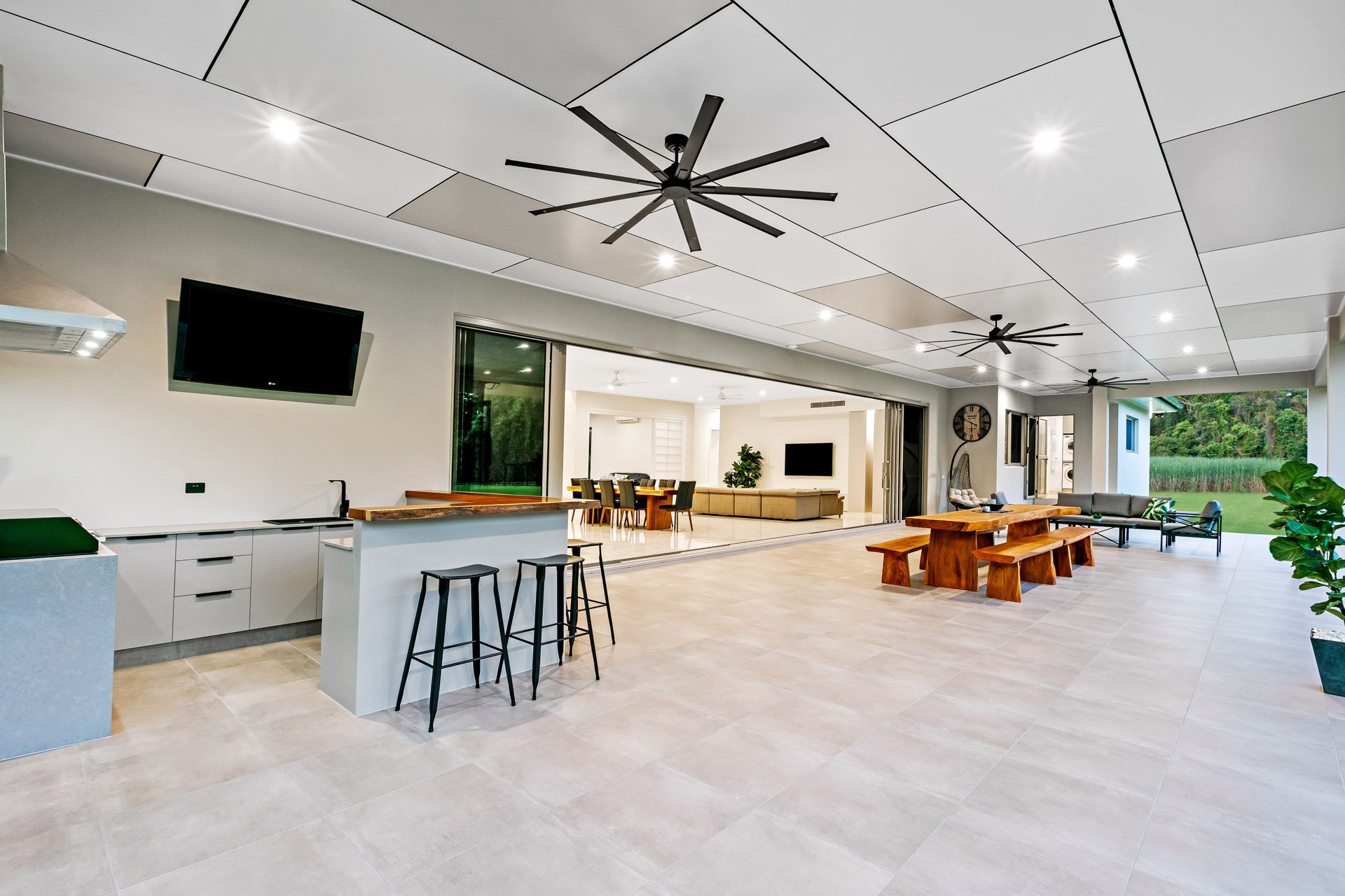 Spacious, Covered Outdoor Patio Featuring a Kitchen Bar — Ashlee Jones Homes in Gordonvale, QLD