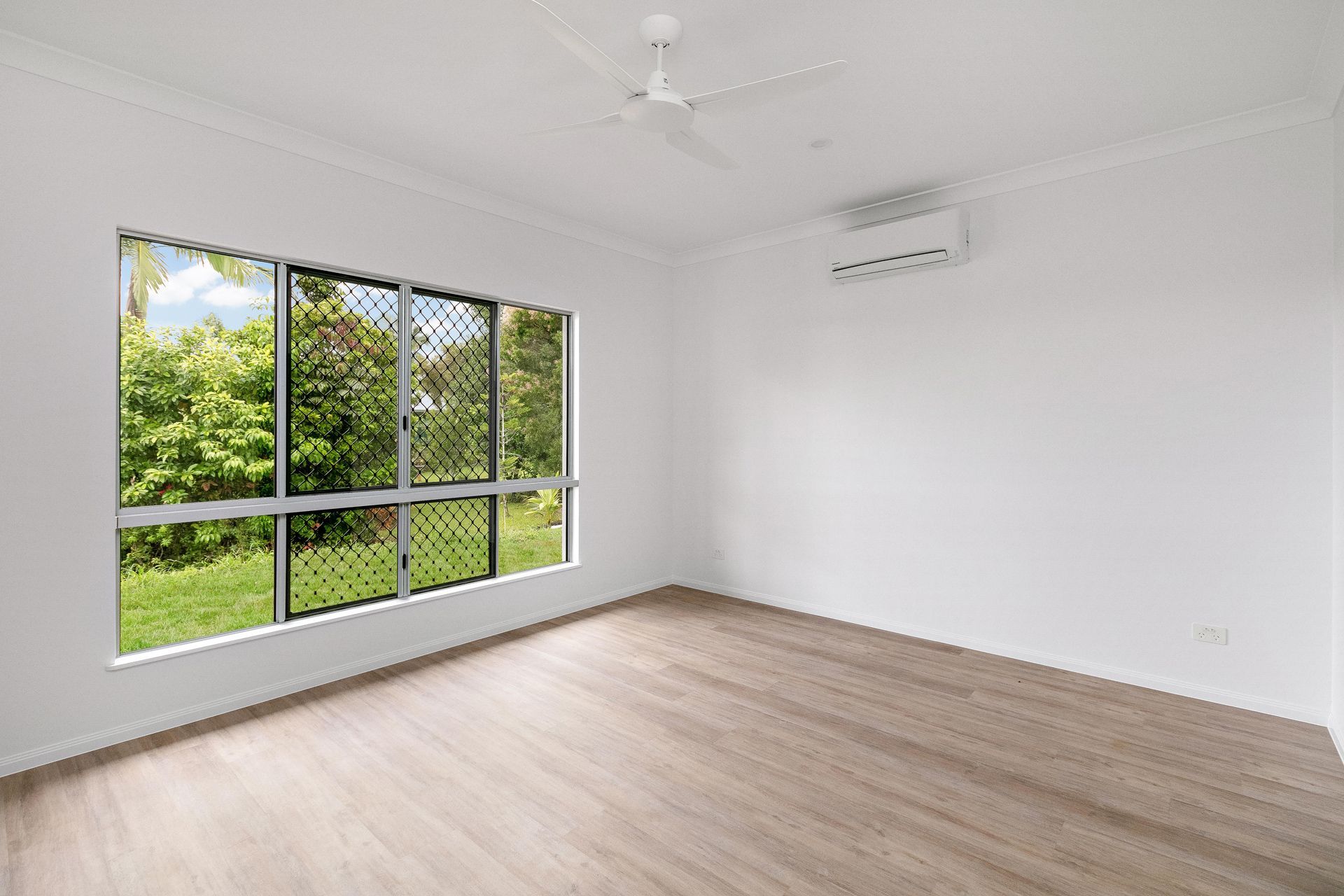 A Bright, Empty Room With White Walls — Ashlee Jones Homes in Gordonvale, QLD