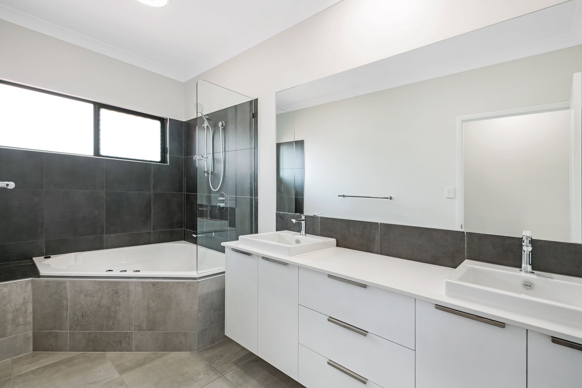 Modern Bathroom With White Double Vanity, Charcoal Tiles — Ashlee Jones Homes in Gordonvale, QLD