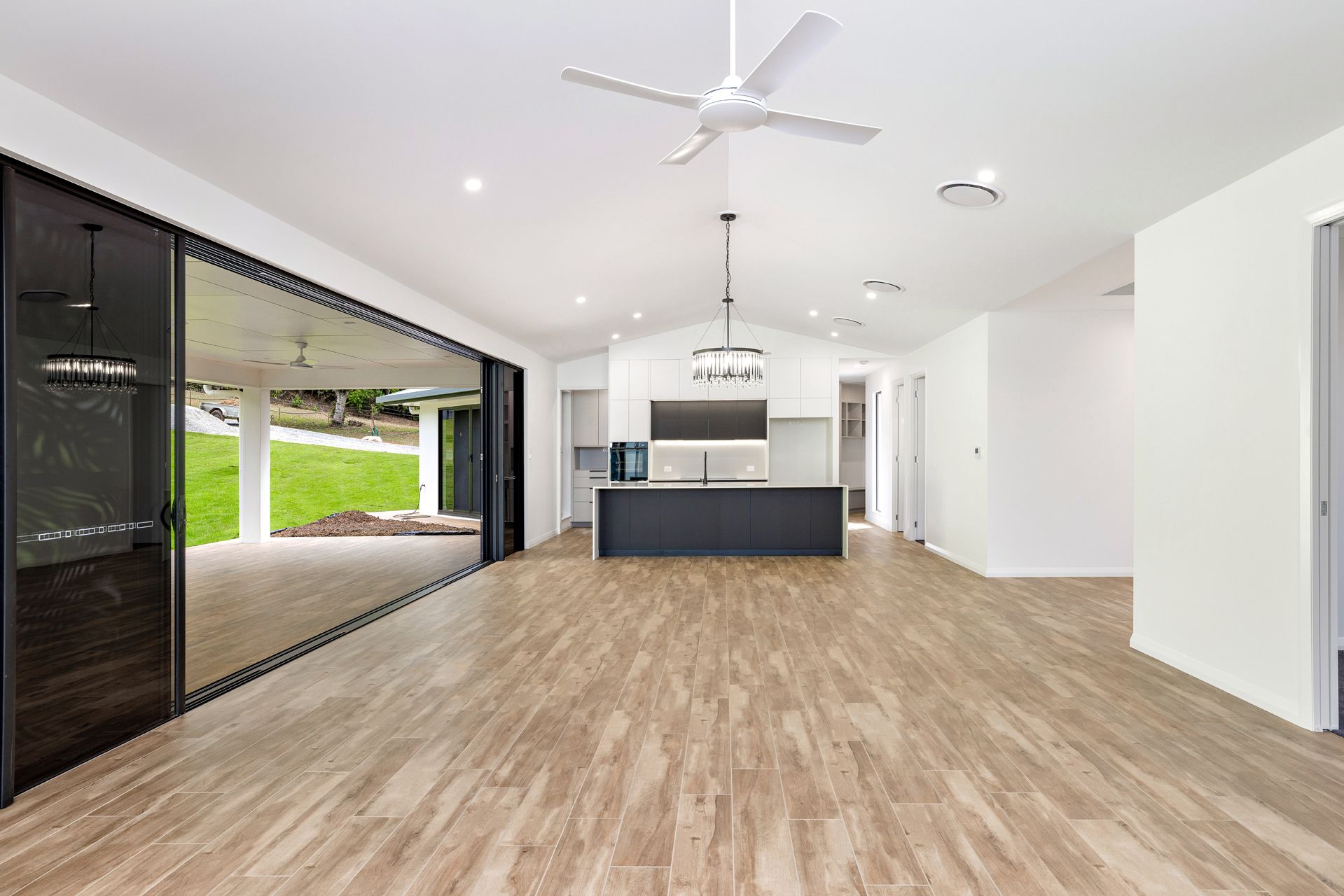 Open-concept Interior With Light Wood Flooring — Ashlee Jones Homes in Gordonvale, QLD