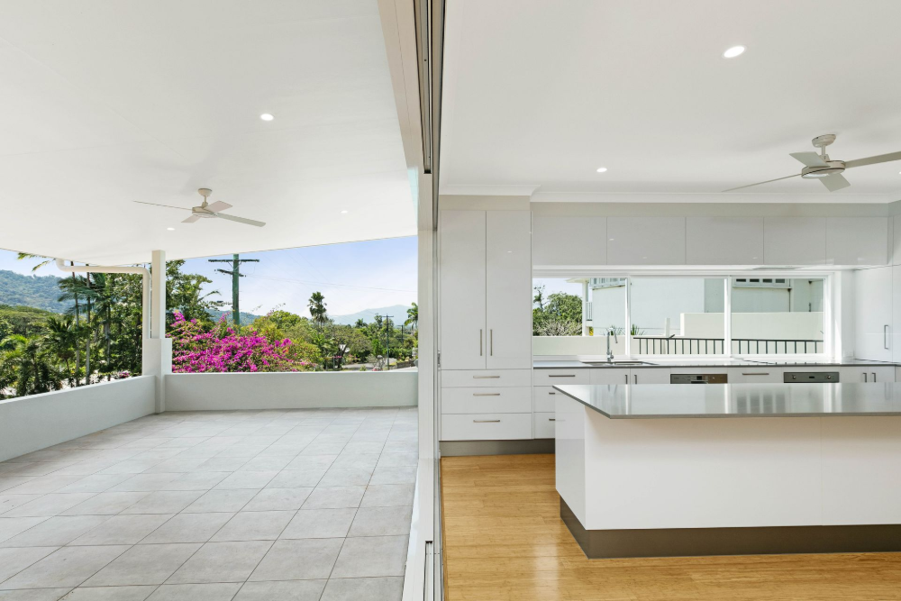 There is a Ceiling Fan on the Porch of a House — Ashlee Jones Homes in Gordonvale, QLD