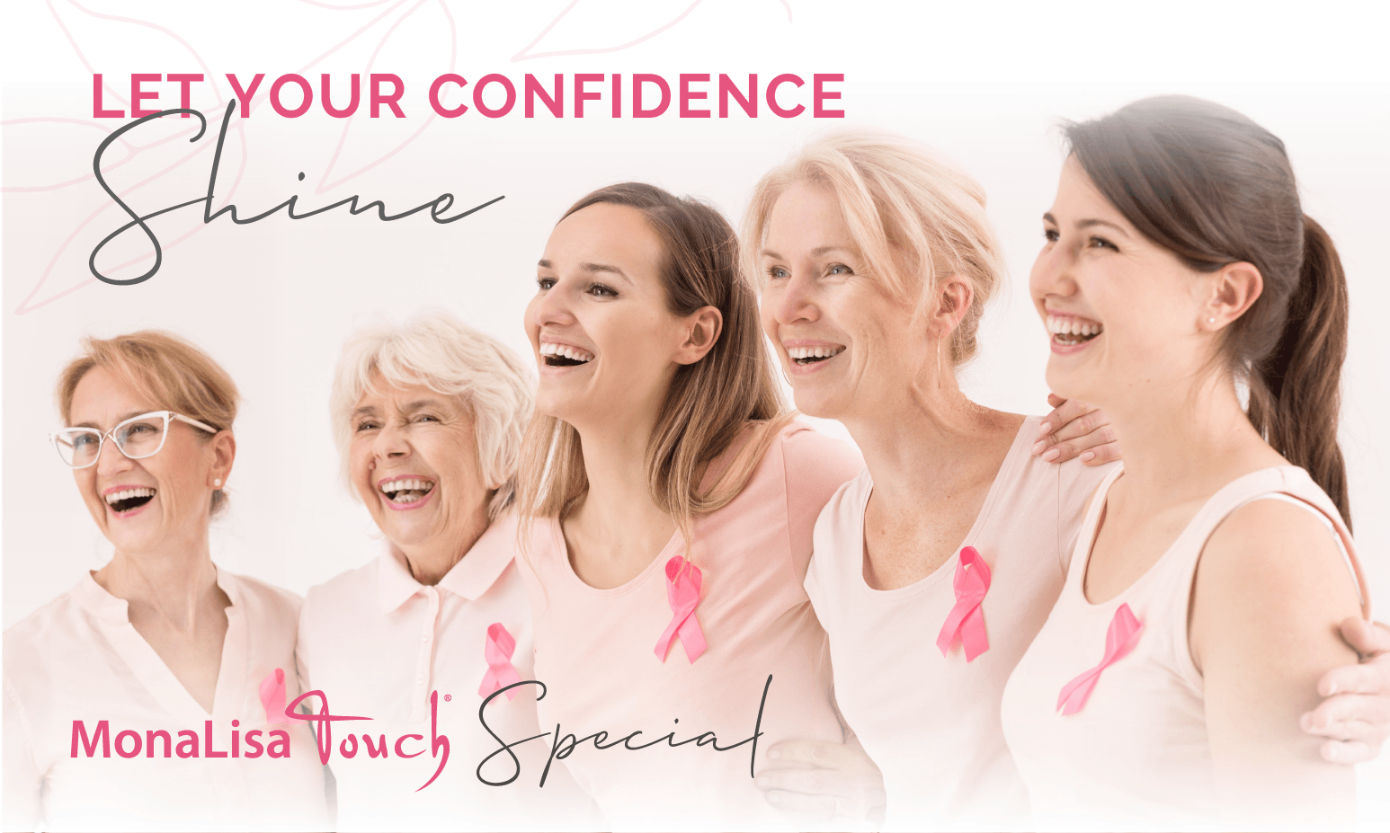 Five women smiling, wearing pink ribbons, in front of
