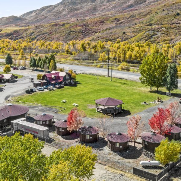An aerial view of a campground in the mountains