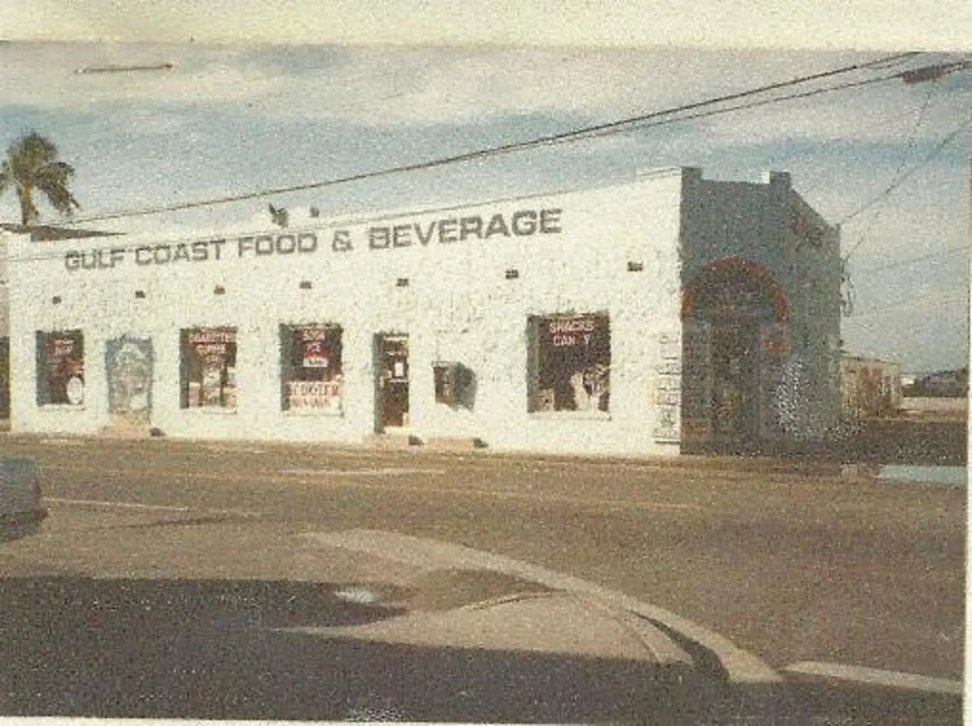 A black and white photo of a gulf coast food and beverage store
