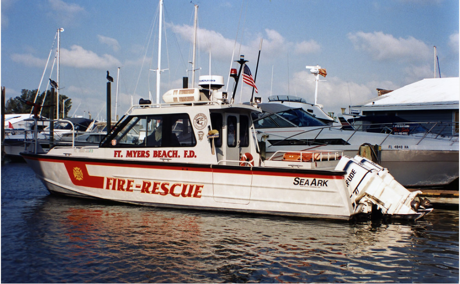 A fire rescue boat is docked in the water