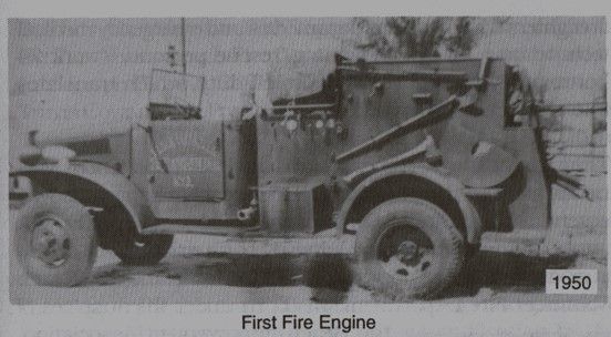 A black and white photo of a fire engine from 1950
