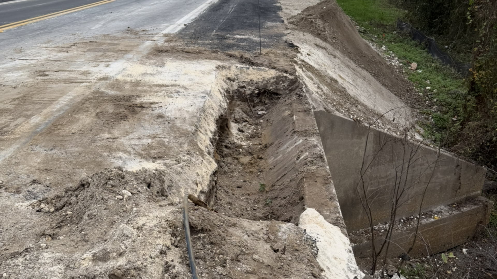 Erosion control installation on slope with protective soil stabilization