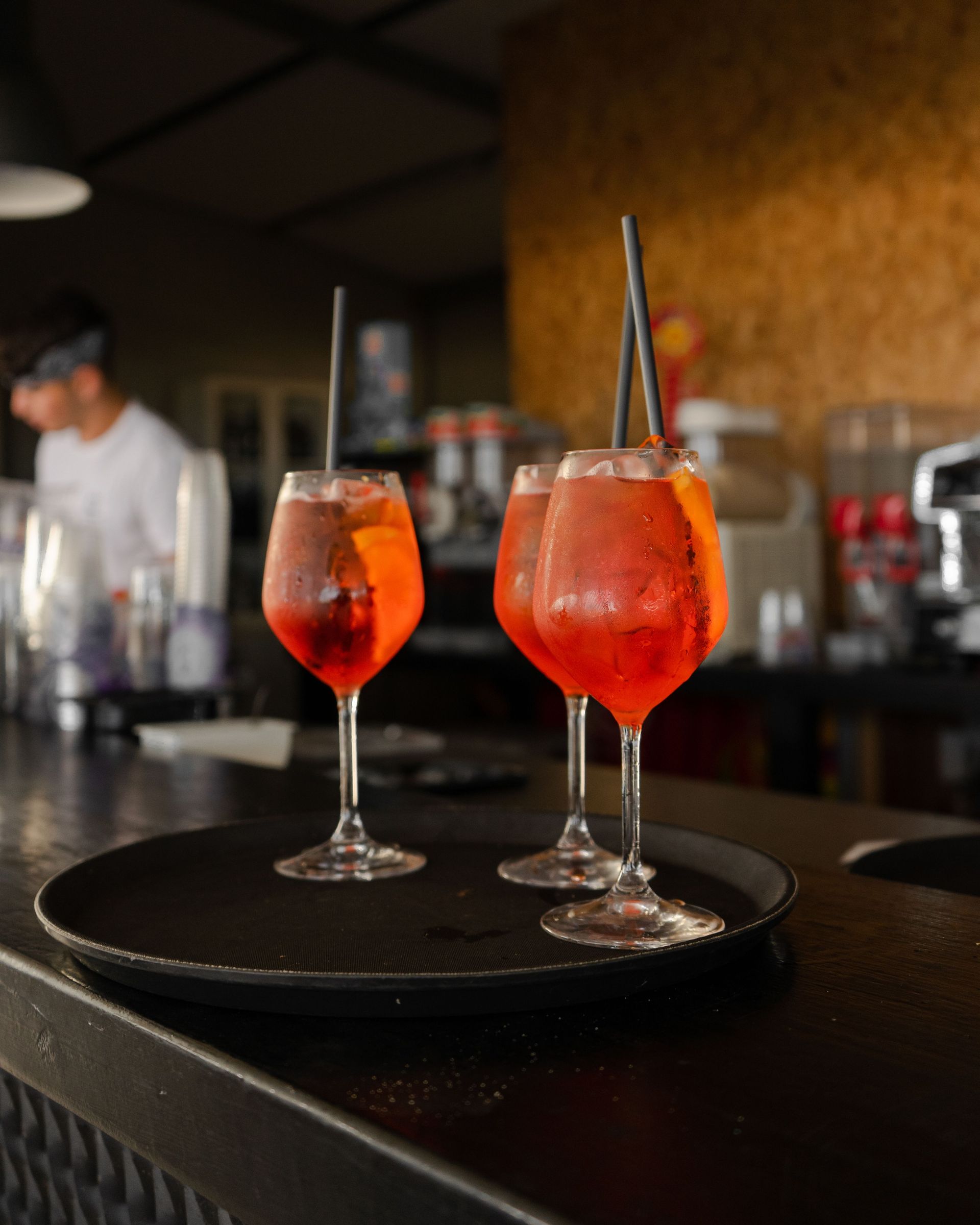 A refreshing Italian aperitivo made with Aperol, Prosecco, sparkling water, ice, and fresh orange.