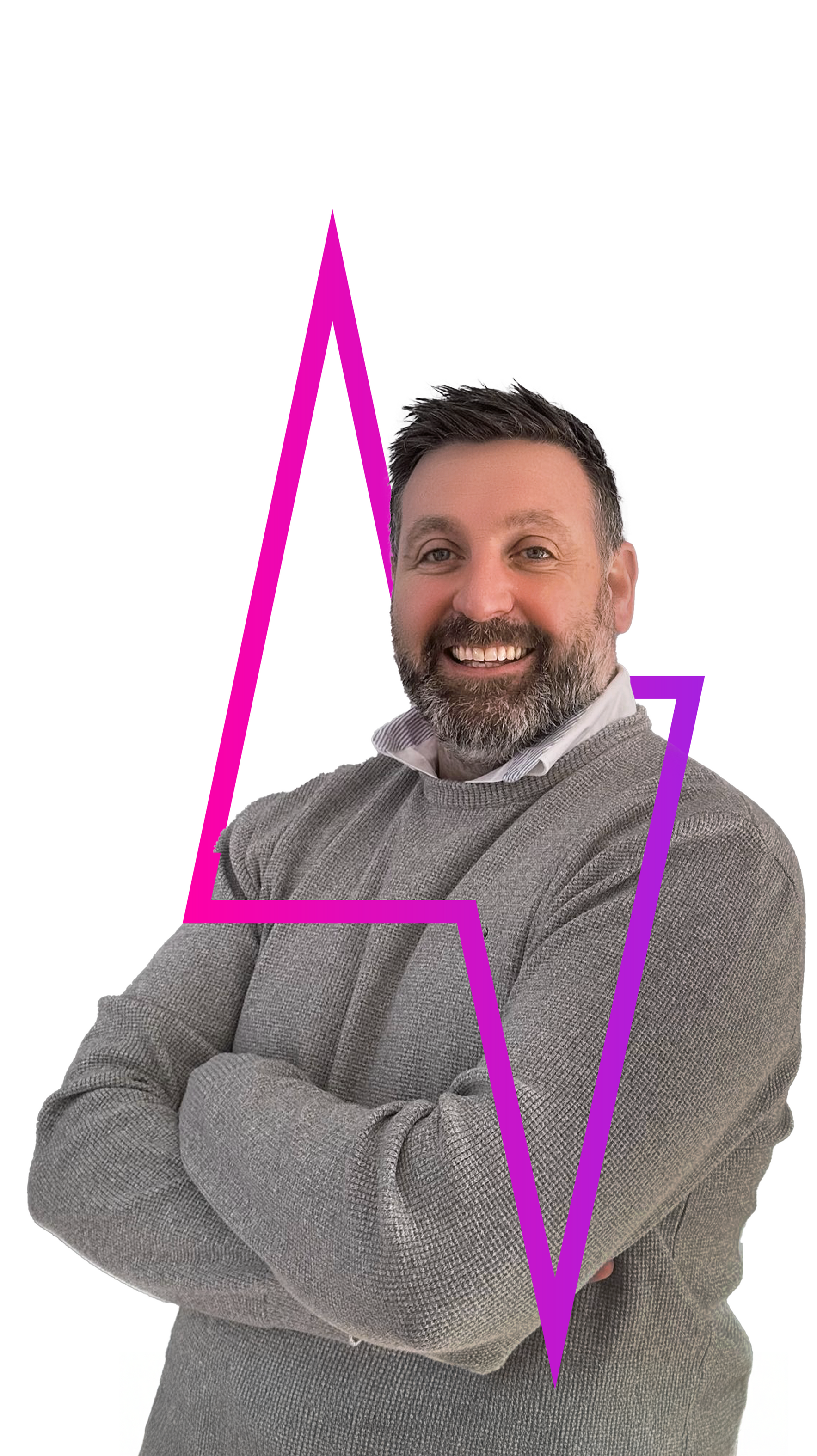 A smiling man with a beard and gray sweater stands with his arms crossed, framed by a neon magenta graphic shape.