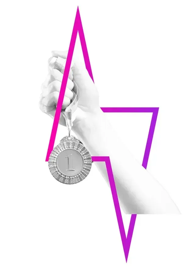 A hand holds a silver medal with the letter 