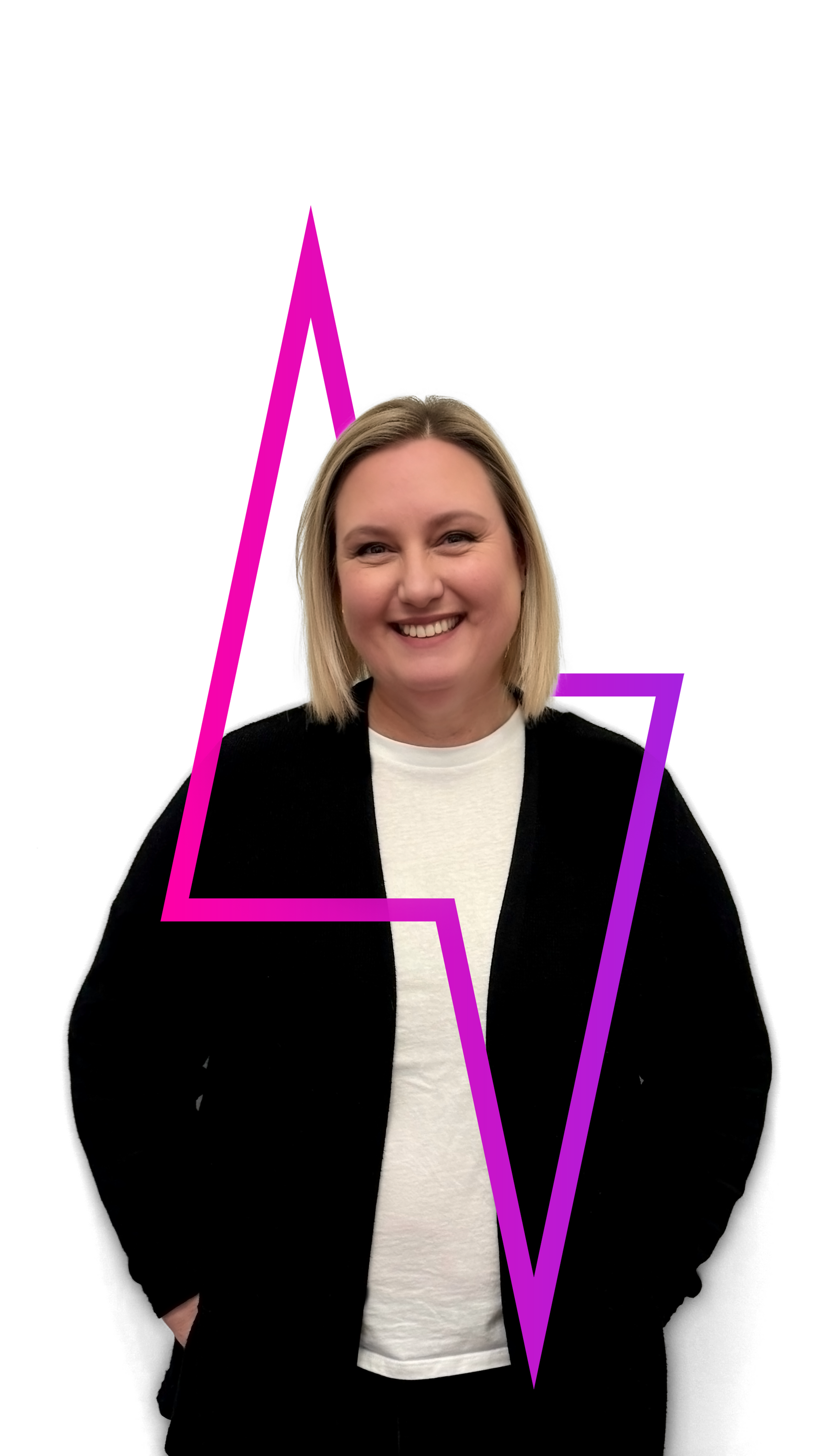 A smiling person in a white shirt and black cardigan stands behind a stylized, bright pink lightning bolt graphic.