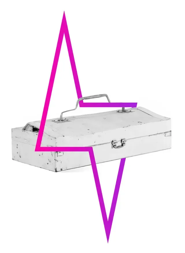 A white metal toolbox marked by a large, magenta zigzag shape overlaid across its center.