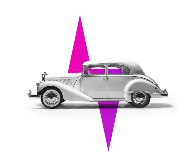A vintage white car in profile, bisected by a large, vertical hot-pink lightning bolt shape against a white background.