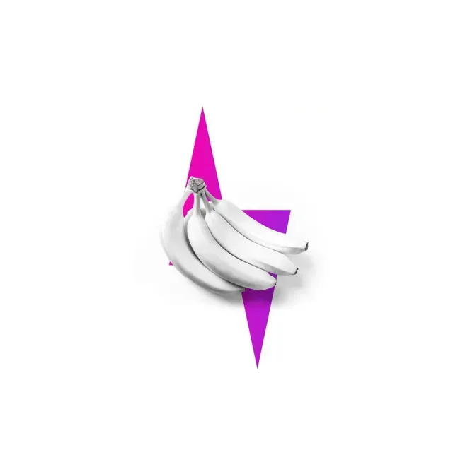 A bunch of white bananas centered over a stylized, bright pink lightning bolt shape against a plain white background.