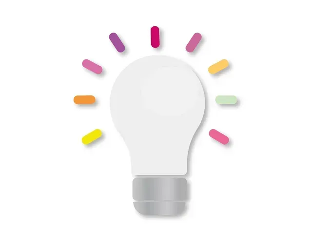 A white lightbulb icon surrounded by a semi-circle of small, multi-colored capsules representing rays of light.
