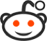 The Reddit mascot, a white, rounded alien character with a small antenna and two bright orange eyes, smiling.